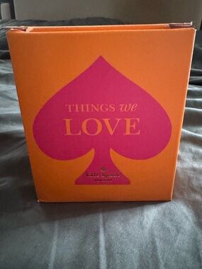 kate spade Orange Box with Pink Text 'Things We Love'